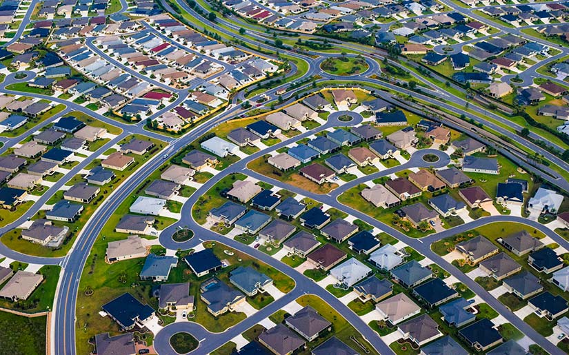 Aerial photo of a cluster of houses in Orlando, Florida. The roofs are shown, which NREL analysts assessed using the dGen model to determine if there is potential for solar rooftop PV adoption.