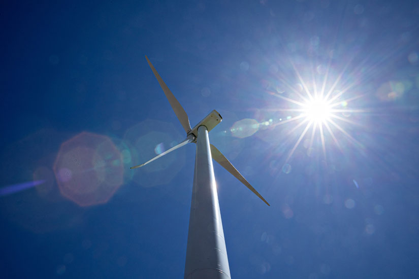 Wind turbine in the sun.