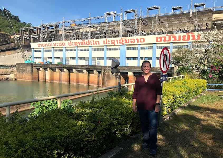 Sherry Stout stands in front of a Moroccan hydropower dam