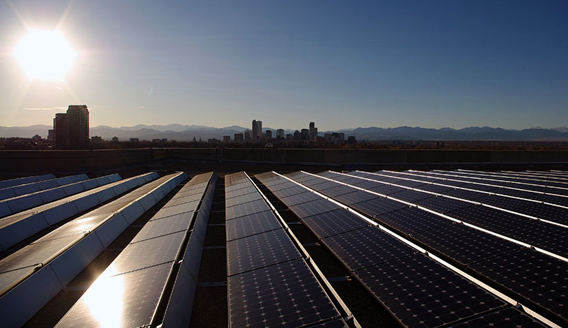 The sun reflecting off a PV array at the Denver Museum of Nature and Science