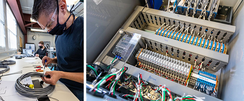 On the left, Casey Nichols works on a laptop while Andrew Simms works with some wires, and on the right, a metal box full of colorful wires and circuits.