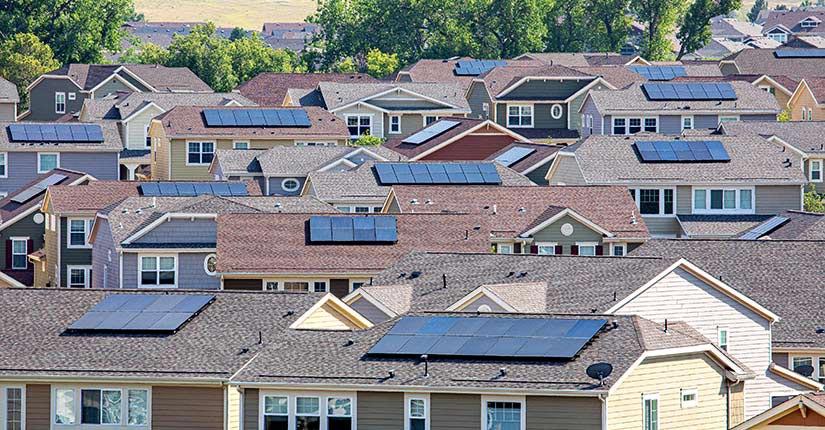 A neighborhood of homes in Golden, Colorado with rooftop solar installations.