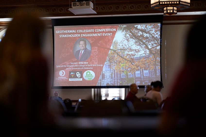 Slide projected into a ballroom that reads Geothermal Collegiate Competition Stakeholder Engagement Event.