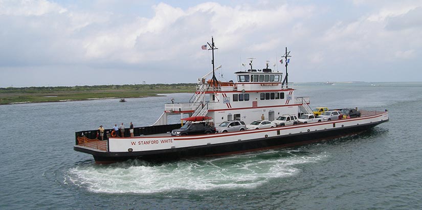 A ferry on a body of water.