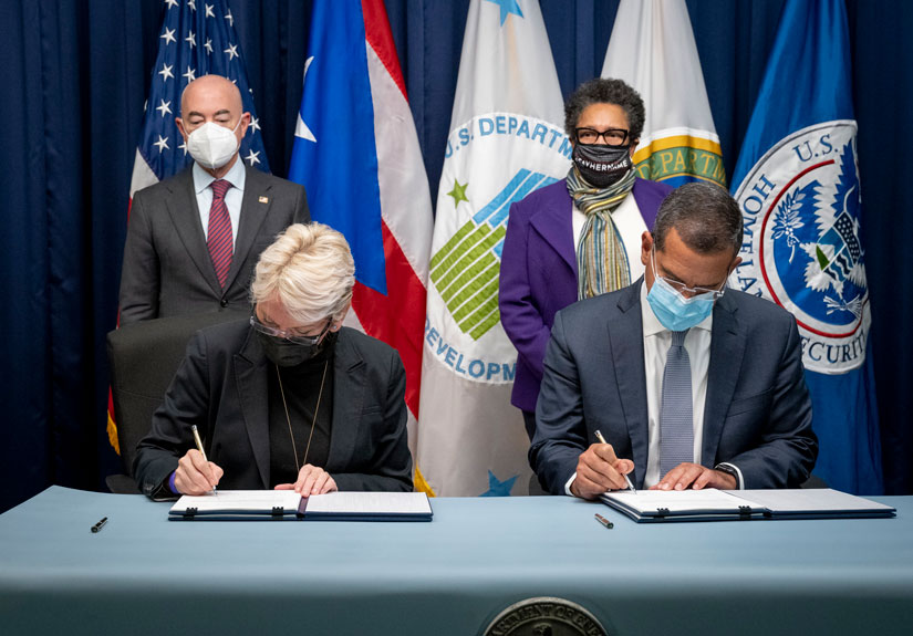 DOE Secretary Jennifer Granholm and Puerto Rico Governor Pedro Pierluisi sign a memorandum of understanding.