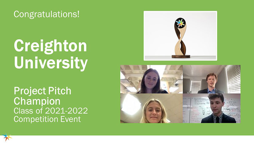 A screenshot of four students and a trophy with text that says "Congratulations! Creighton University Project Pitch Champion Class of 2021-2022 Competition Event"