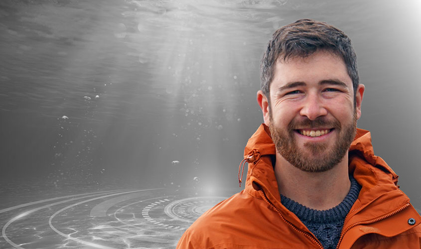 A headshot of Patrick overlain on a black-and-white underwater photo.