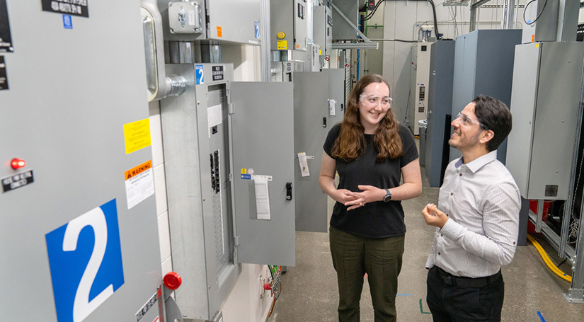 A JUMP into STEM intern views a National Renewable Energy Laboratory (NREL) facility with her mentor.