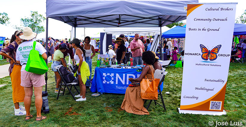 Attendees of the 10th Annual Global Fest stop by NREL’s booth.
