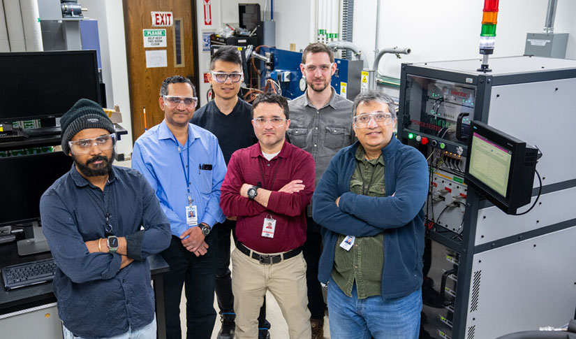 Faisal Khan pictured alongside researchers from NREL's APEEM group.