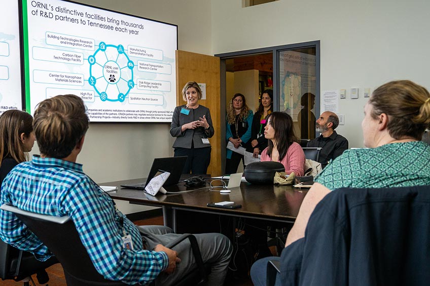 A group of people in a conference room.