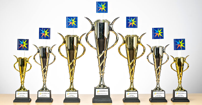 Solar District Cup trophies.