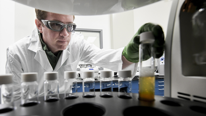 A person working in a lab. 