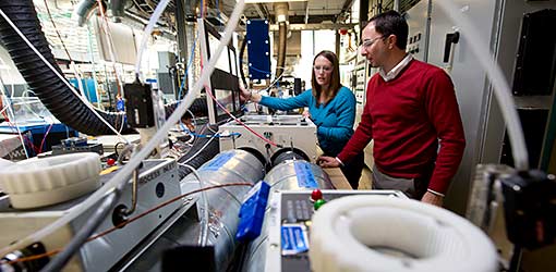 NREL researchers conduct research on a prototype at the HVAC Systems Laboratory
