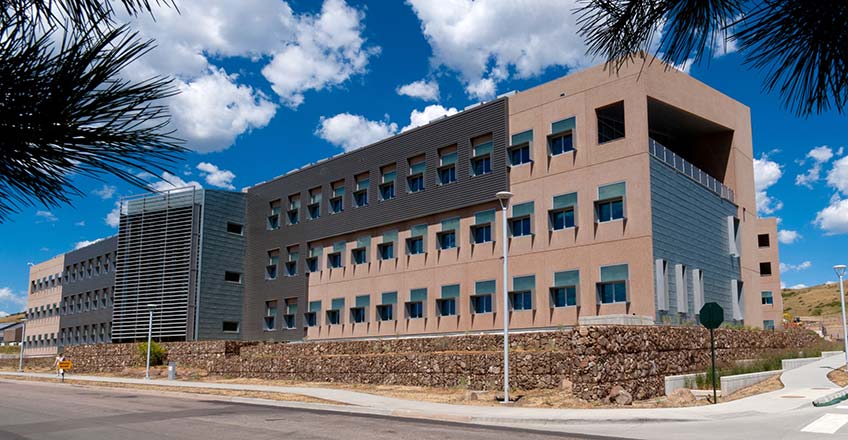 NREL building showing windows with shading and transpired solar collector wall.