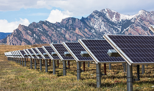 The 1MW photovoltaic array at the Flatirons Campus of the National Renewable Energy Laboratory has a backdrop of the foothills of the Rocky Mountains.