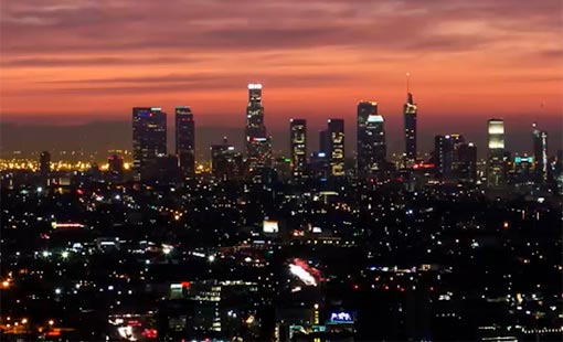 Photo of the Los Angeles skyline at dusk.