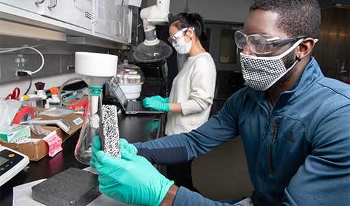 Two researchers in a laboratory.