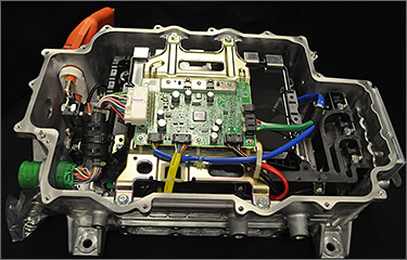 A photo of the internal components of an automotive inverter.