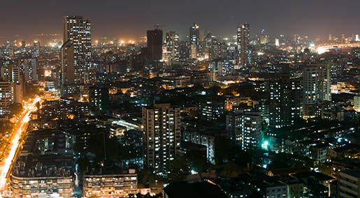 A cityscape filled with lights at night.