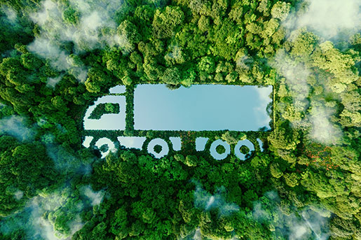 Top view of trees surrounding water source in the shape of a tractor trailer.