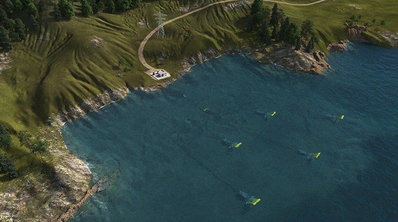 Aerial view of ocean shoreline with wave energy devices in the water.