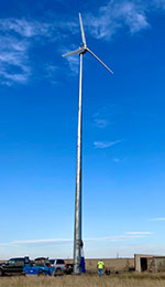 Active-yaw, upwind, stall horizontal-axis wind turbine wind turbine in field