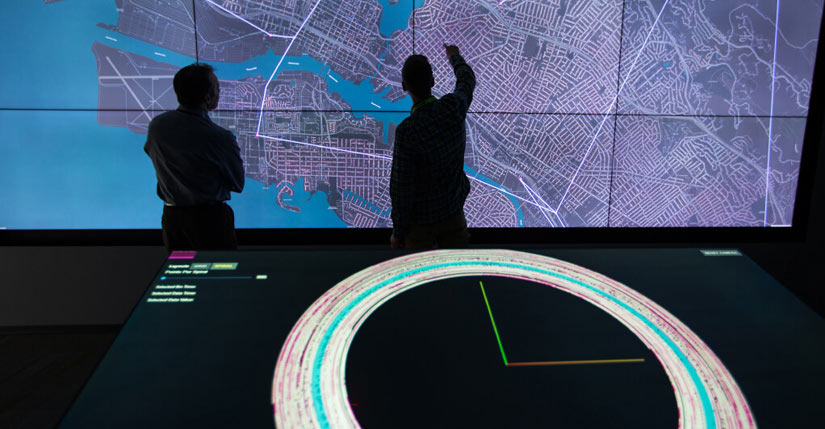 Researchers trying out new features in the 2-D Visualization Laboratory in the Energy Systems Integration Facility.