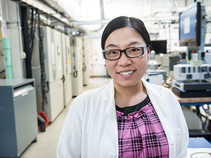 Battery Aging and Control Engineer Ying Shi in NREL's Thermal Test Facility